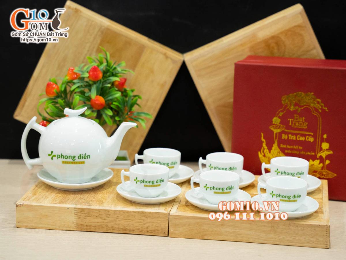 Bộ ấm chén dáng bưởi cành men trắng in logo VTV, 600ml Bộ ấm chén dáng bưởi cành men trắng in logo VTV, 600ml