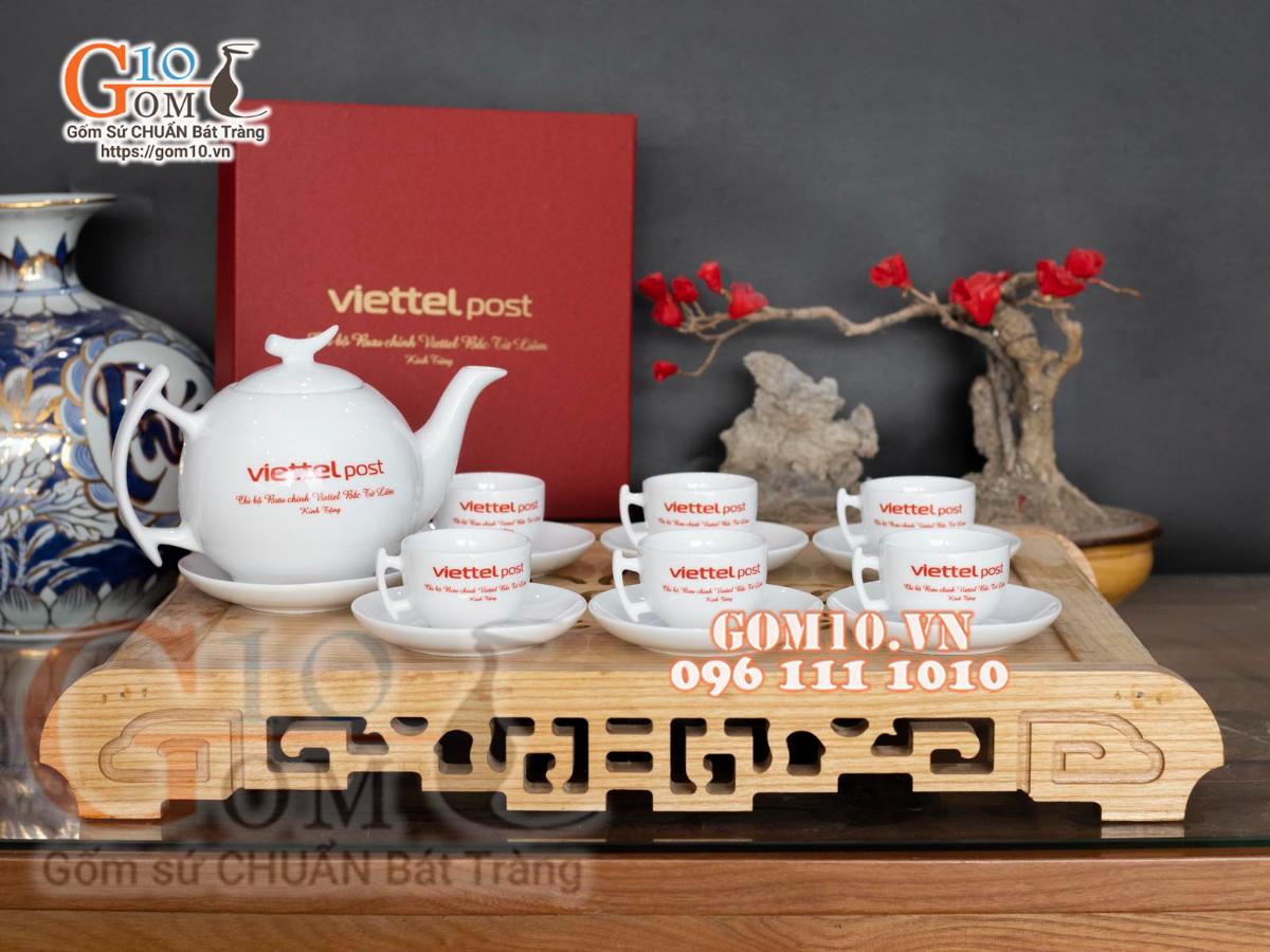 Bộ ấm chén dáng bưởi cành men trắng in logo VTV, 600ml