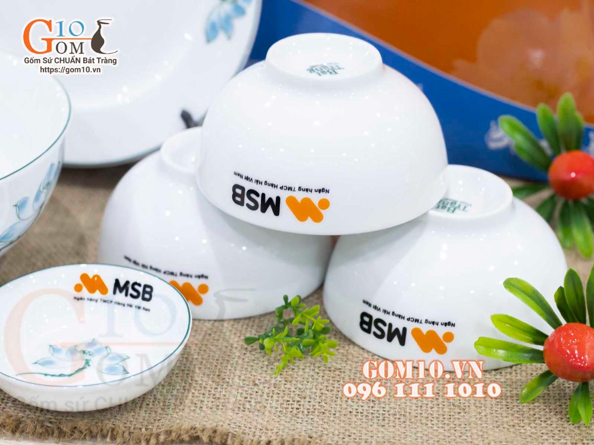 Bộ đồ ăn quà tặng men trắng vẽ sen xanh, in logo Bộ đồ ăn quà tặng men trắng vẽ sen xanh, in logo