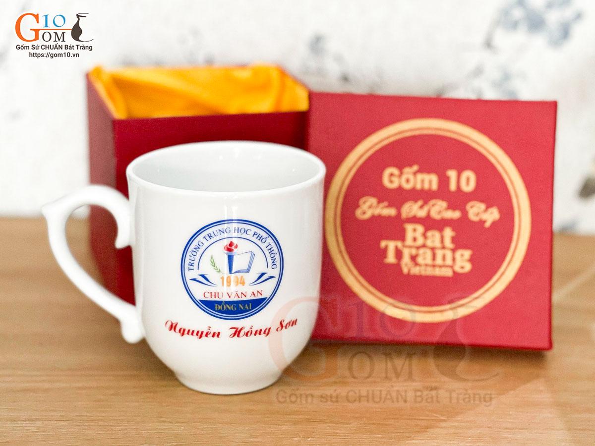 Cốc sứ men trắng dáng chóp lửa có nắp, in logo quà tặng Cốc sứ men trắng dáng chóp lửa có nắp, in logo quà tặng