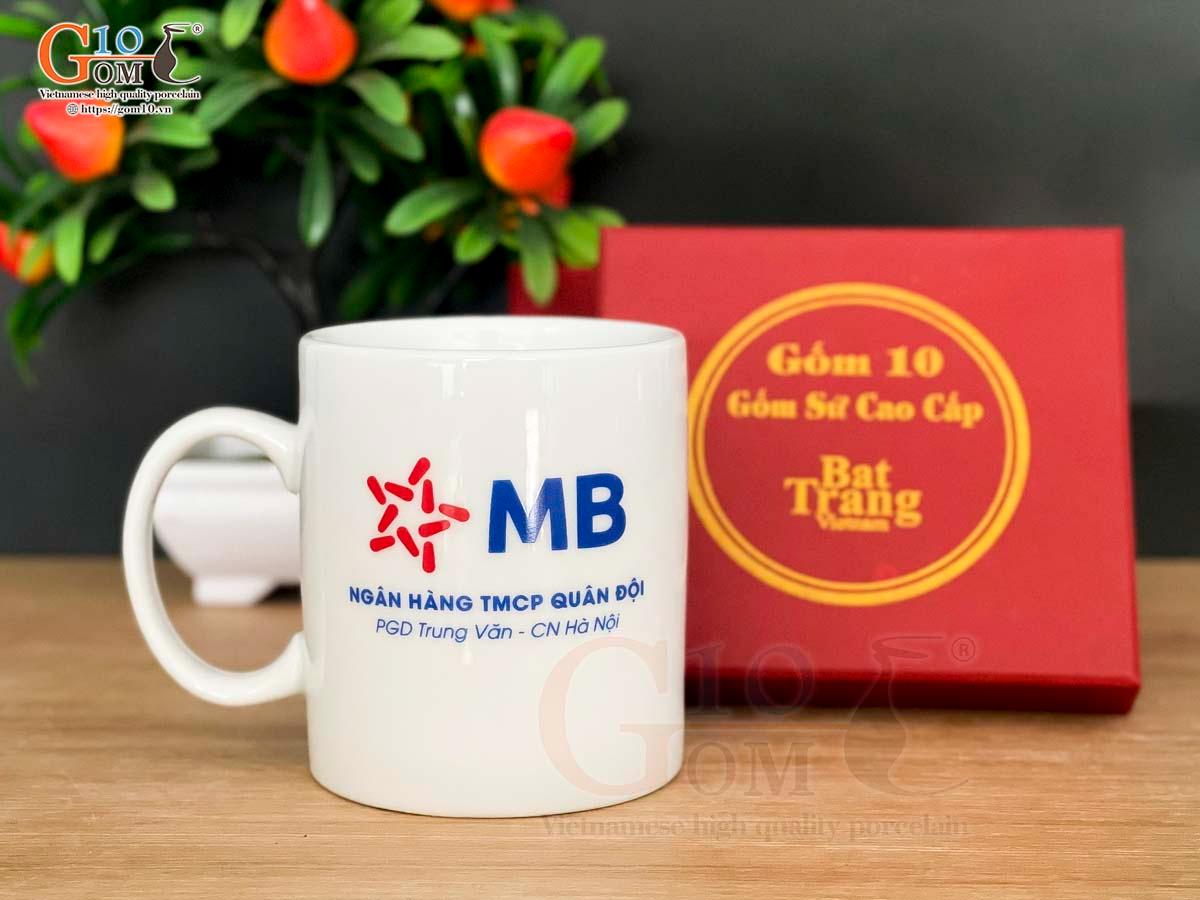 Cốc sứ quai tròn men trắng, in logo quà tặng Cốc sứ quai tròn men trắng, in logo quà tặng